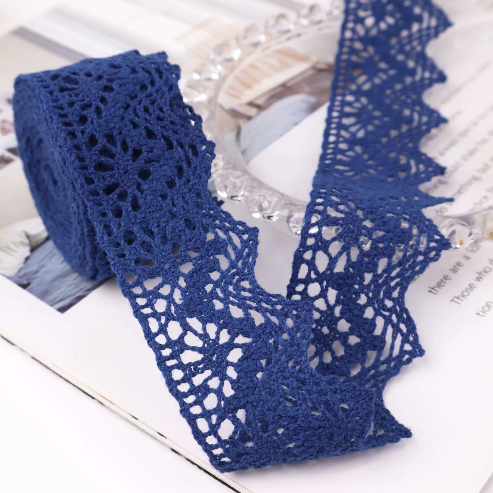 IDONGCAI cluny crochet lace trim in navy blue showing 1.5 inch wide cotton floral lace in a 2 yard length