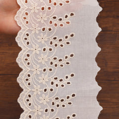 Close-up of cotton eyelet lace scalloped edge texture for DIY decoration
