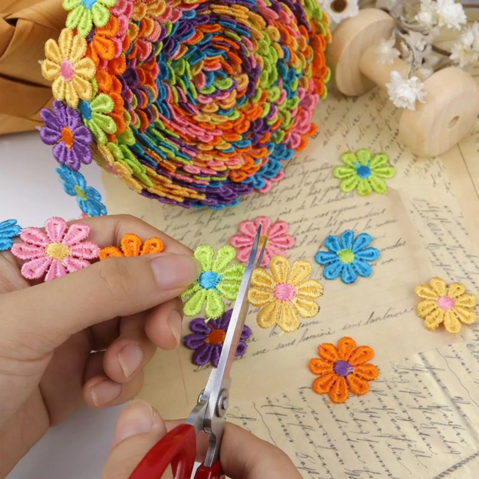 Close-up of IDONGCAI Daisy Flower Lace Trim cut into patches, ready for DIY sewing or patchwork projects