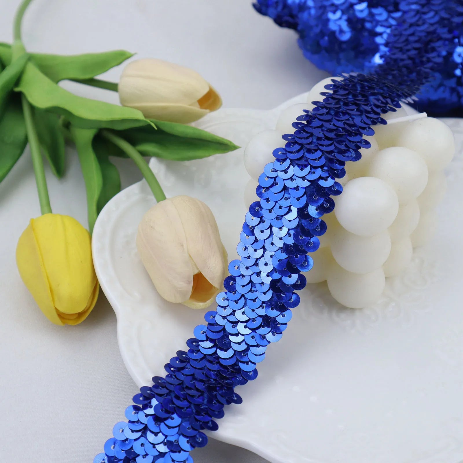 Blue elastic sequins trim with shimmering metallic paillettes for DIY fashion and costumes