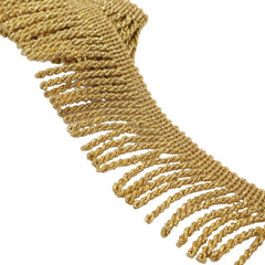 Close-up detail of metallic chainette tassel fringe trim with glitter texture