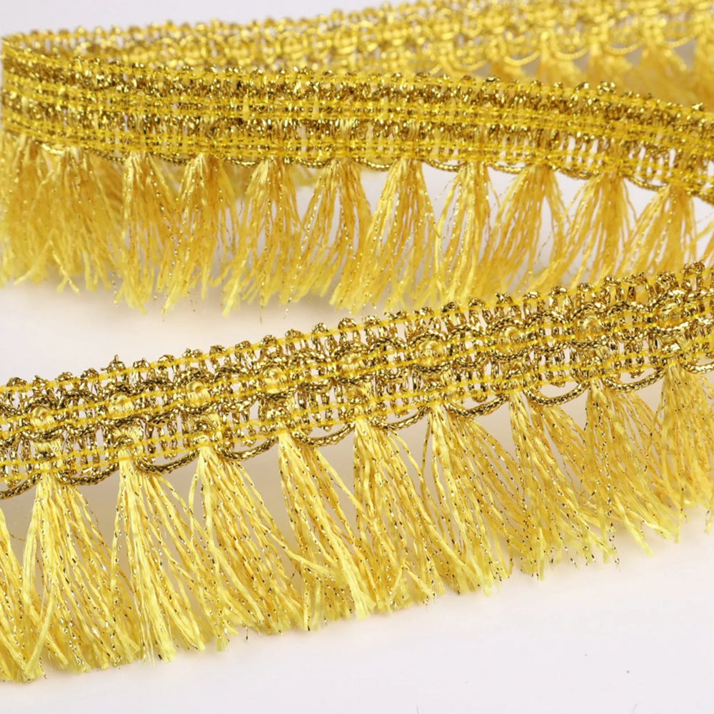 Close-up of Golden Tassel Fringe Trim Texture and Tassel Chainette Detail