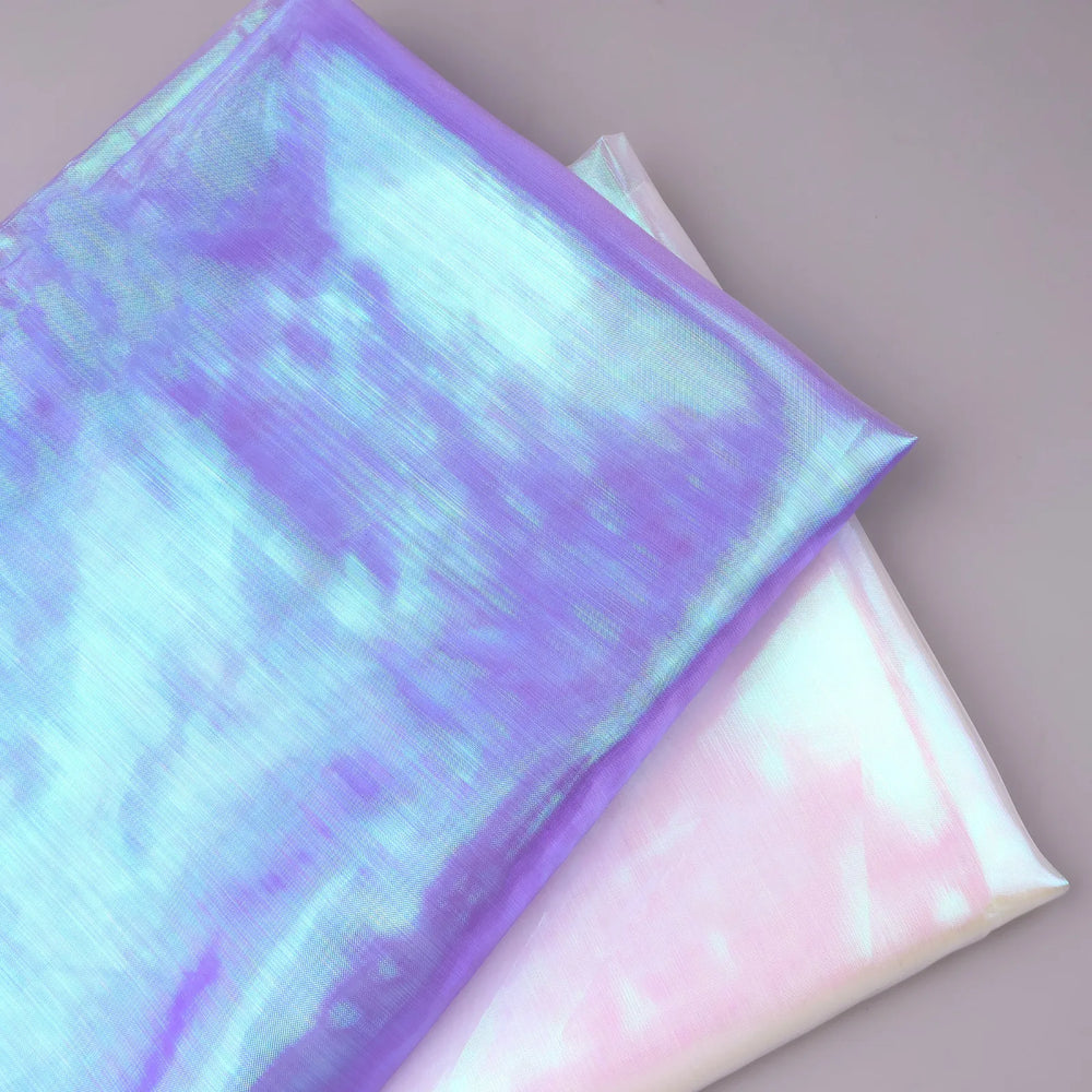 Iridescent chiffon fabric available in white and purple color options