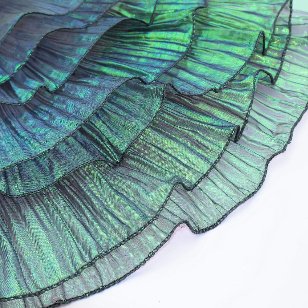Detail of Iridescent Chiffon Ruffle Trim texture, highlighting pleated ruffles and shiny organza finish