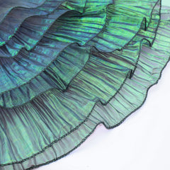 Detail of Iridescent Chiffon Ruffle Trim texture, highlighting pleated ruffles and shiny organza finish