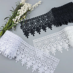 Venise floral embroidered lace trim color options displayed in a flat lay, featuring white, ivory, and black for multi-color SKU selection